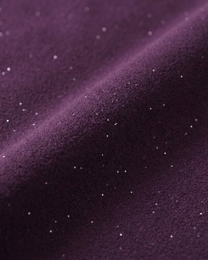 Close-up of purple sparkle fleece fabric with fine metallic flecks