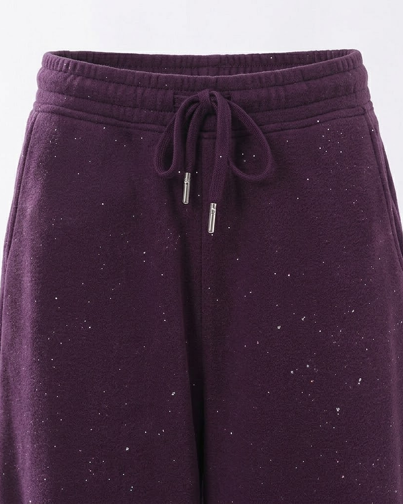 Close-up of the purple pants elastic waist and drawstring