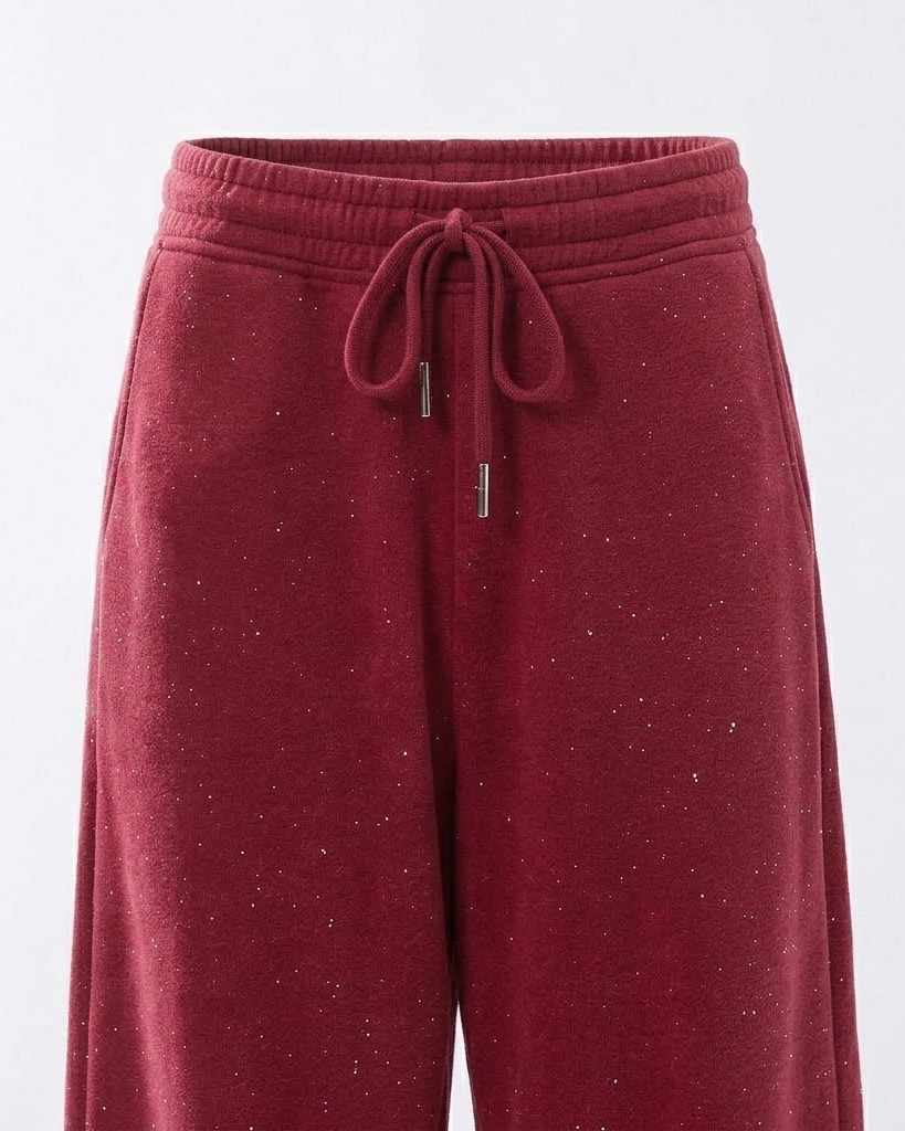 Close-up of the red pants elastic waist and drawstring